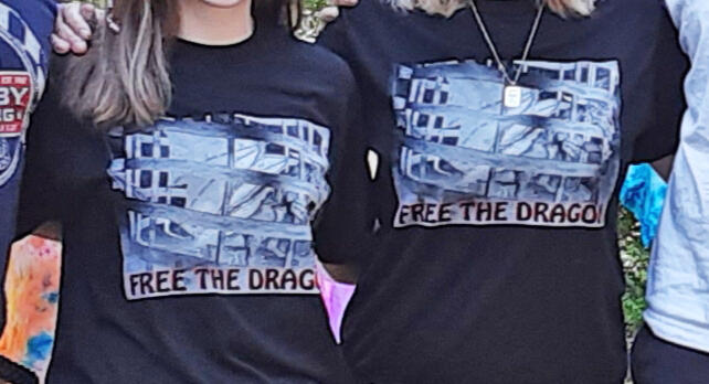 Super Fam wearing Lyrical Dragon Free the Dragon shirts